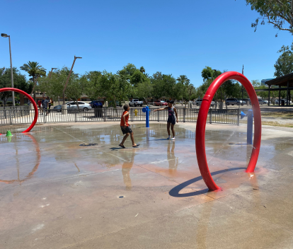 Photo of Jaycee Splash Pad with water running and kids playing.